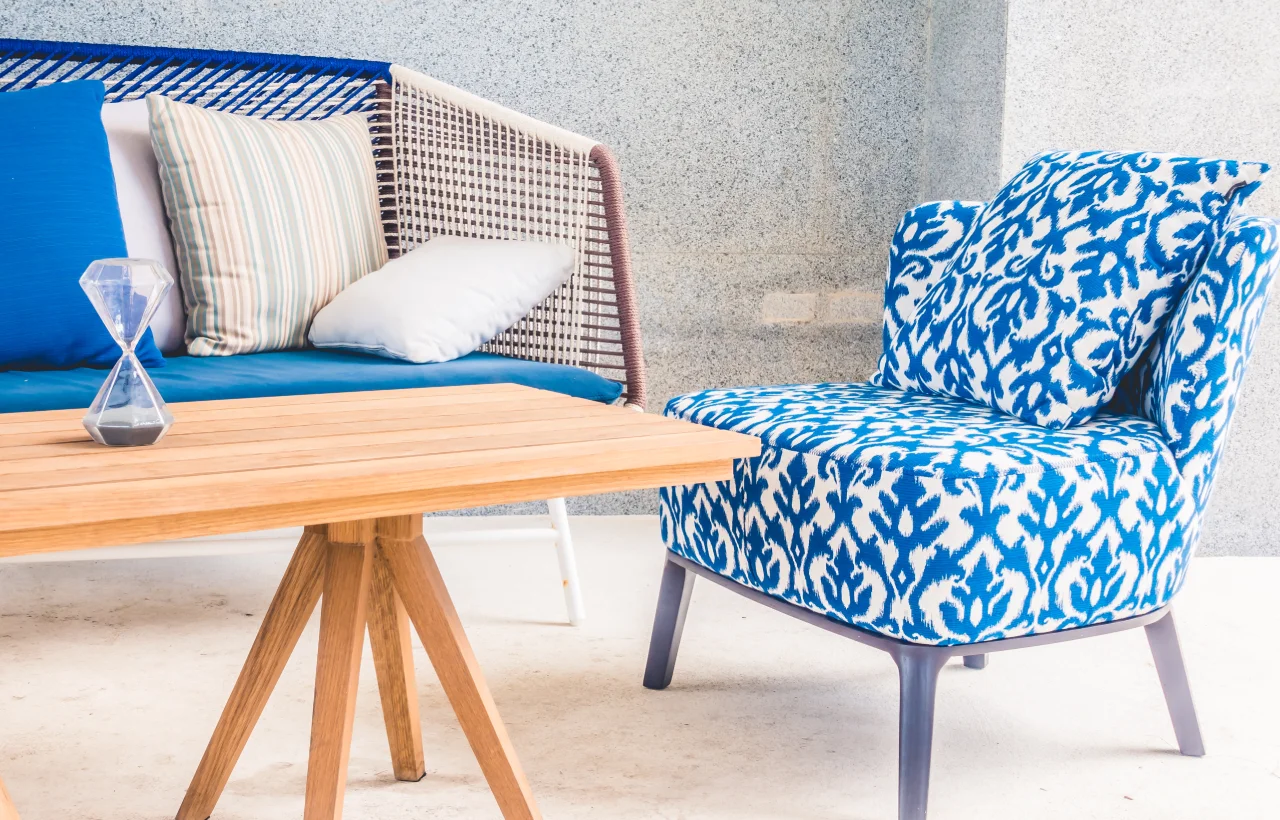 Blue and white patterned chair and table.